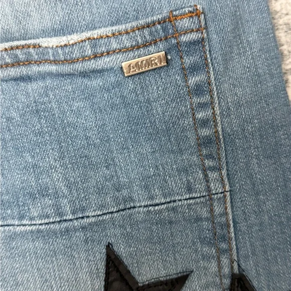 Women's Blue Jeans with Black Star Accents